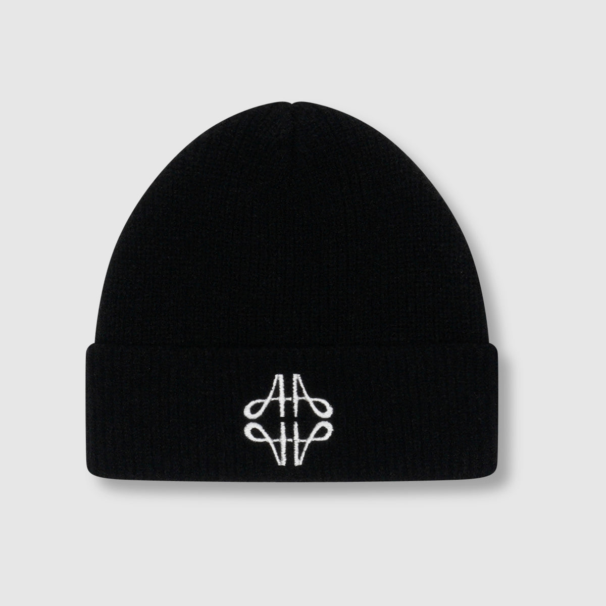 Bonnet en tricot avec emblème duveteux