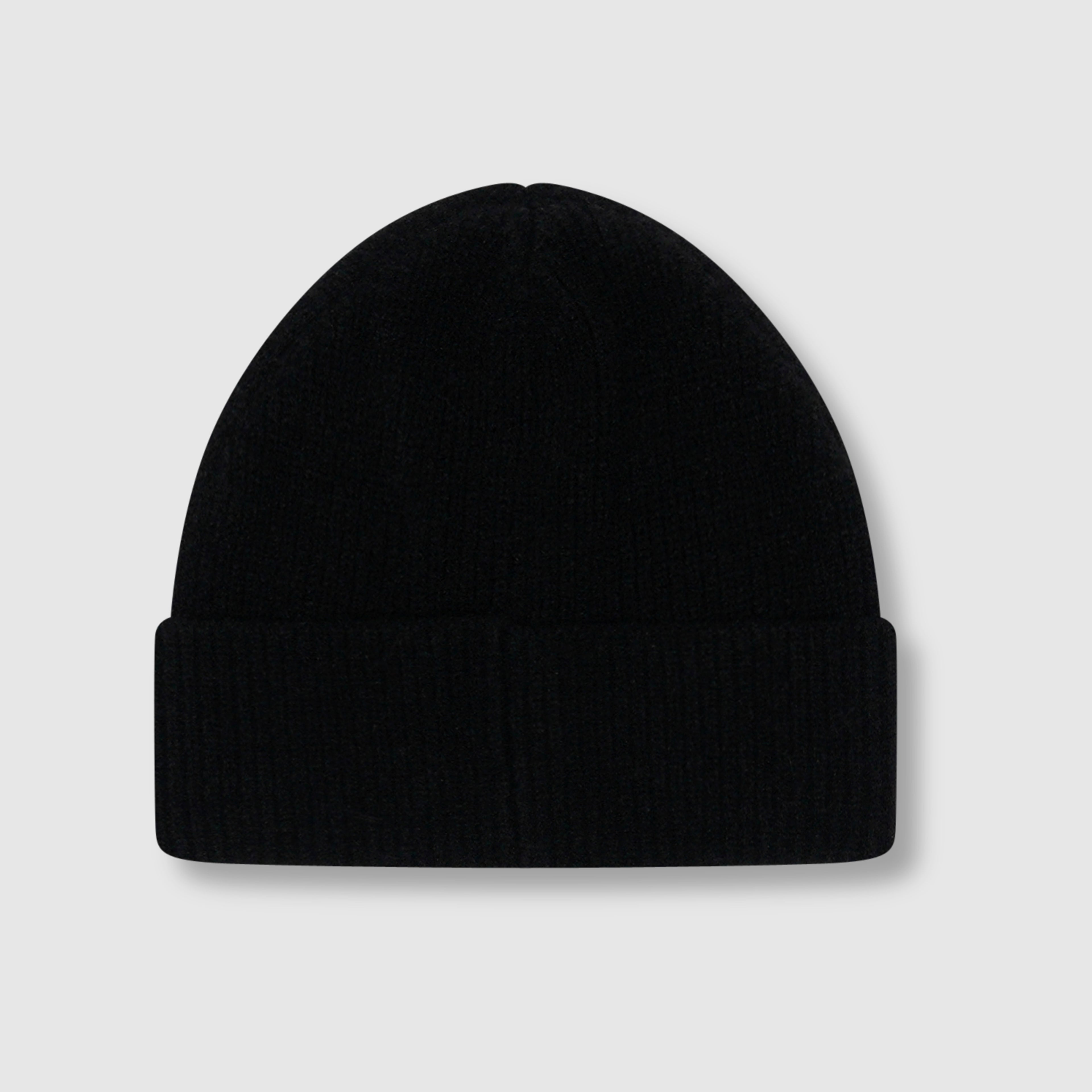 Bonnet en tricot avec emblème duveteux